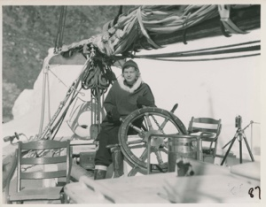 Image of Miriam MacMillan at wheel of the Bowdoin